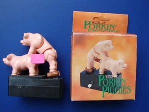 Wind Up Toy Naughty Porkin Pigs These Guys Are Makin' Bacon Pipedream Inc - Picture 1 of 11