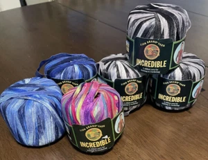 6 Skeins Varigated Incredible Lion Brand Yarn Black & White, Blues & Carnival - Picture 1 of 12
