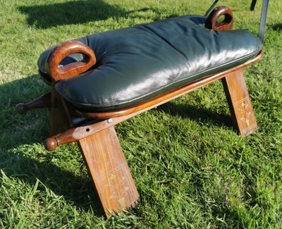 Moroccan camel saddle stool exquisitely crafted. Leather mahogany brass inlay. - Image 1 of 4