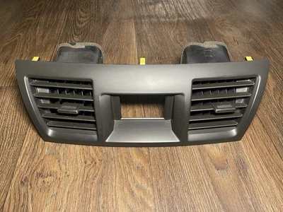 OEM TOYOT HIGHLANDER 2008-2013 TABLERO CENTRAL DELANTERO AIRE ACONDICIONADO VENTILACIÓN MOLDURA NEGRO Foto 1 de 4