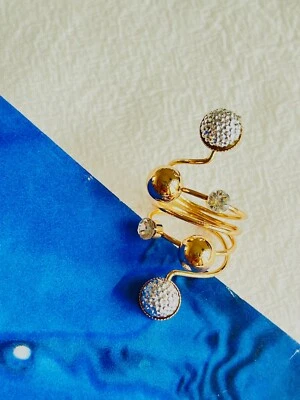 Anillo de cóctel grande espiral brillo cristales bolas cuatro hilos halo dorado para mujer Foto 1 de 4