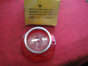 NORS 1964 Chevrolet Bel Air Back Up Lens With Chrome Ornament Bezel