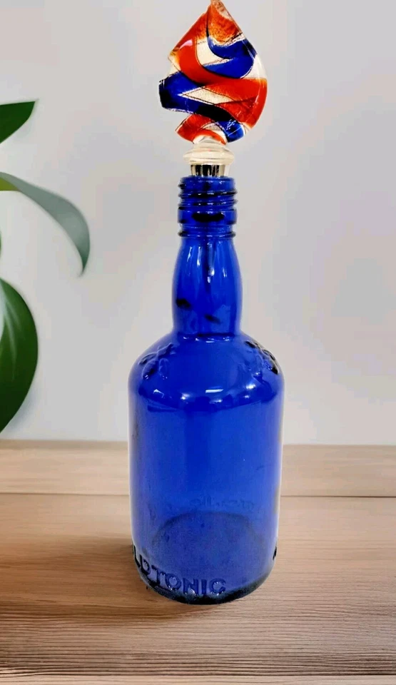 Blue Wild Tonic Bottle Cobalt Modern with Embossed Bees and Glass Stopper - Image 1 of 4