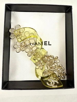 CHANEL 2018/2019 Gripoix-Style Pale Pink Flowers +  Green Ribbon Lucite Brooch - Image 1 of 4