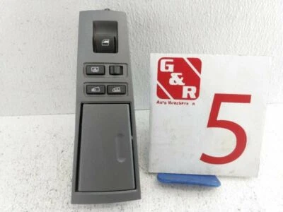 BMW 745i 2003 interruptor de pantalla de ventana trasera izquierda con bisel de moldura compartimento de almacenamiento OEM Foto 1 de 4