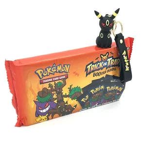 2024 Trick or Trade Booster Bundle 35 Mini Packs While + Umbreon Charm - Picture 1 of 3