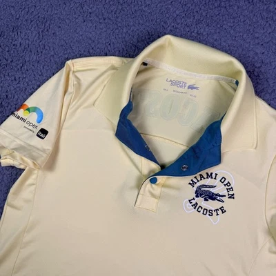 Polo de tenis deportivo Lacoste Miami Open 2025 para mujer XS (2) amarillo con botones a presión Foto 1 de 4