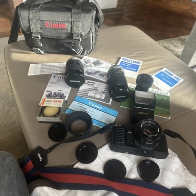 CANON T 70 analoge Spiegelreflexkamera mit 3 objektiven Zubehörpaket Beschreib. - Bild 1 von 4