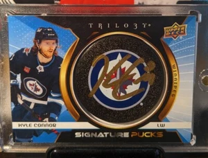 Kyle Connor 2023-24 Upper Deck Trilogy Signature Pucks Gold Auto #/24 💎💎💎 - Picture 1 of 2