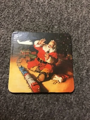 Coca-Cola - Vintage Christmas Coaster Santa Claus - Playing With Train - Image 1 of 2