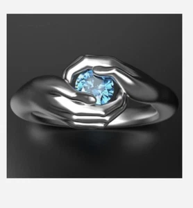 ANILLO DISFRAZ MANOS PLATA SOSTENIENDO PIEDRAS PRECIOSAS AZULES TALLA 5 6 7 8 9 - Imagen 1 de 1