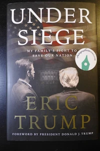 ERIC TRUMP AUTOGRAPHED UNDER SIEGE NEW SIGNED TRUMP FAMILY BOOK 2025 - Picture 1 of 3