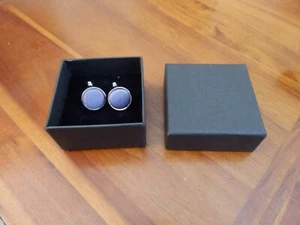 A boxed pair of cufflinks, metal, purple round insert - Picture 1 of 2