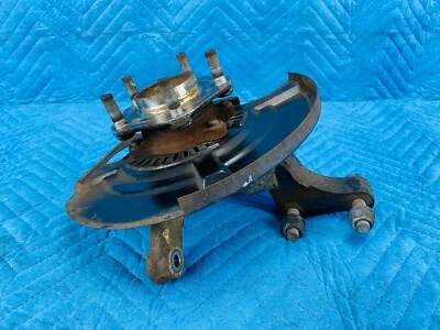 Husillo de nudillo conductor delantero Nissan NV200 SV con buje y escudo 2013-2018 OEM Foto 1 de 4