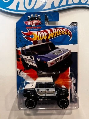 2011 HOT WHEELS HUMMER H2 EL SEGUNDO POLICE 1/10 MAIN STREET - Image 1 of 2