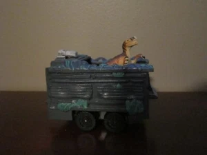 MATCHBOX JURASSIC PARK DEPÓSITO DE COMBUSTIBLE JUEGO SEMIRREMOLQUE CON VELOCIRAPTOR SITIO B - Imagen 1 de 11