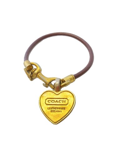 Bracciale COACH cuore oro pelle BRW donna