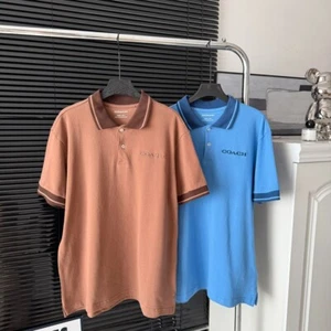 NUEVO CON ETIQUETAS COACH Camiseta Polo Hombre Azul y Marrón Algodón Orgánico - Imagen 1 de 8