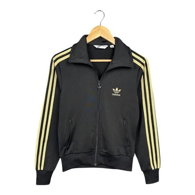 ADIDAS Originals Firebird Trefoil 轨道上衣夹克女式黑色/金色 38 码 — 第 1/4 张图片