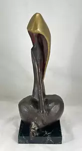 Scultura in bronzo firmata Braslow 111/4" seduta donna con cappuccio - numero 12/25 - Foto 1 di 13