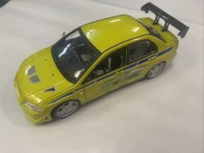 1/18 DIECAST RACING CHAMPIONS 2 FAST 2 FURIOUS 2002 MITSUBISHI LANCER EVO VII Foto 1 de 4