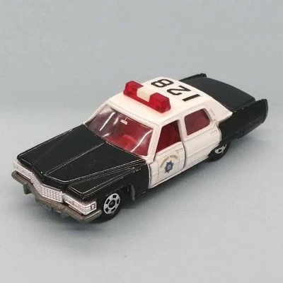 Coche de policía TOMY Cadillac usado Foto 1 de 4