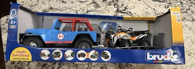 NIB Bruder Jeep Cross Country Racer w/Driver, Trailer, & Quad Bike (4-wheeler) - Image 1 of 4