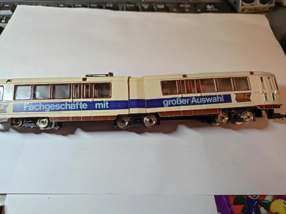 AHM H0 Strassenbahn "mc Modellbahn Center" Gleichstrom defekt - Bild 1 von 1