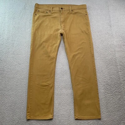Pantalones de mezclilla ajustados rectos elásticos ajustados marrón camel 38x30 Levi's 513 para hombre Foto 1 de 4