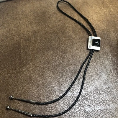 Vaquero occidental vintage de plata esterlina con ónix negro trenzado Bolo Foto 1 de 4