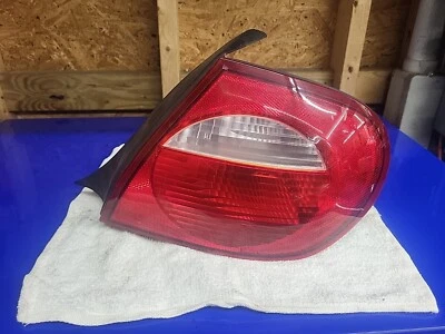 2003 2004 2005 DODGE NEON RIGHT PASSENGER SIDE TAIL LIGHT BRAKE LIGHT OEM AA - Image 1 of 4