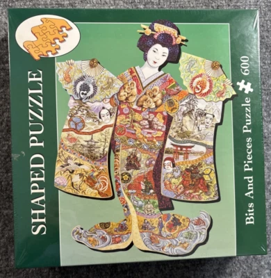 Geisha Girl Puzzle Bits and Pieces 600 Piece Shaped 2003 Collage New Sealed - Image 1 of 4