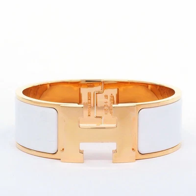 Brazalete HERMES Click Crack PM H dorado x blanco color resina/plástico [brazalete] Foto 1 de 4