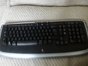 LOGITECH LX710 Laser - Cordless Keyboard Wireless ** BROKEN MINI RECEIVER ** - Picture 1 of 6