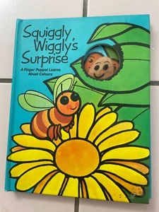 SQUIGGLY WIGGLY'S SURPRISE. FINGER PUPPET LEARNS ABOUT COLOURS. COLLINS SURPRISE - Picture 1 of 6