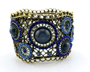 A Kirks Folly Big Wheel Turning Bracelet Antique Gold tone Hinged Cuff Blue - Picture 1 of 5