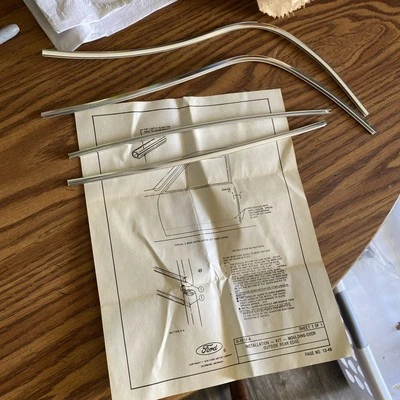 (323)NOS 1984 - 1987 Ford Tempo Door Edge Guard Kit E43Z-5420910-ASP - Image 1 of 2