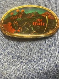 BLUE OYSTER CULT VINTAGE 1977 PACIFICA COLLECTIBLE ROCK & ROLL MYLAR BELT BUCKLE - Picture 1 of 5