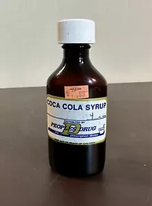 Bottiglia Sciroppo Coca Cola Droga Peoples vintage - Plastica - Foto 1 di 4
