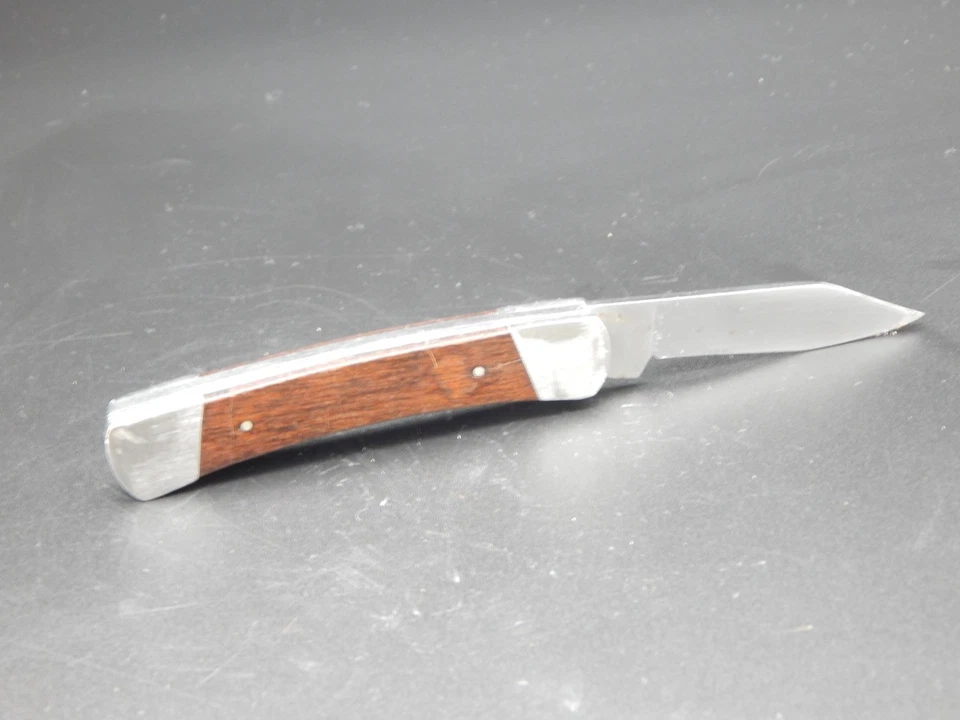 Navaja de bolsillo plegable vintage Buck 703 U.S.A mango de madera marrón Foto 1 de 4