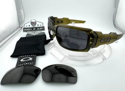 OAKLEY OIL DRUM OLIVA OSCURO CON GAFAS DE SOL POLARIZADAS NEGRAS DEL MERCADO DE ACCESORIOS 03-487 NUEVAS Foto 1 de 4