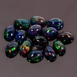 Cabine forma ovale opale etiope nero naturale 4,5 ct lotto 14 pezzi pietra preziosa 6X4X3 mm - Foto 1 di 3