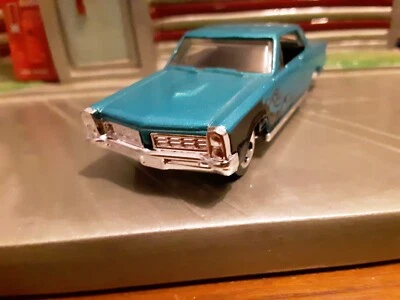 Pontiac GTO 1965 techo rígido escala 1:64 HotWheels coche fundido a presión Foto 1 de 4
