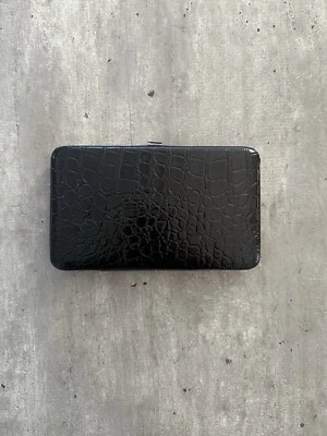 Cartera sin asas Cache negra para mujer  Foto 1 de 4