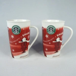 Set of 2 Starbucks 2010 Christmas Red White Coffee Mug Stories gifts SHARE 16oz - Picture 1 of 12
