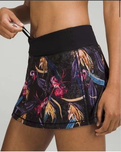 Lululemon Pace Rival mittelhoher Rock verschleiert Blumenmuster schwarz bunt neu mit Etikett Damengröße 10 - Bild 1 von 9