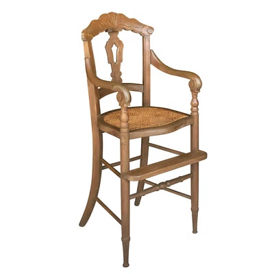 Antigua silla alta para bebé Eastlake victoriana tallada con fondo de caña de nogal Foto 1 de 4