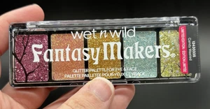 Paleta de brillo Wet N Wild Fantasy Makers para caramelos de ojos y cara desperdiciados 0,17 oz - Imagen 1 de 4