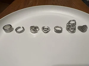 Lot of 7 Vintage Silver Tone Rings Floral Spoon Woven Heart Statement Rings - Picture 1 of 8