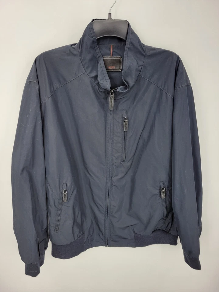 Chaqueta Tumi Tech Para Hombres XXL 2XL Azul Cremallera Bolsillos Bombardero Prendas Exteriores Abrigo Foto 1 de 4